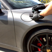 Applying Hermosa Graphene Ceramic Coating to a grey Porsche by hand