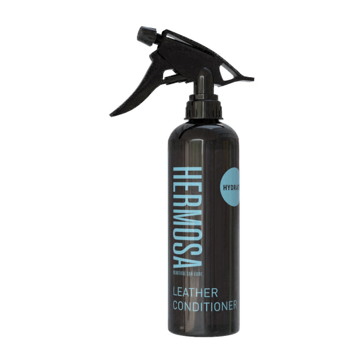 Black leather conditioner spray bottle with blue Hermosa logo and 'Leather Conditioner' text.