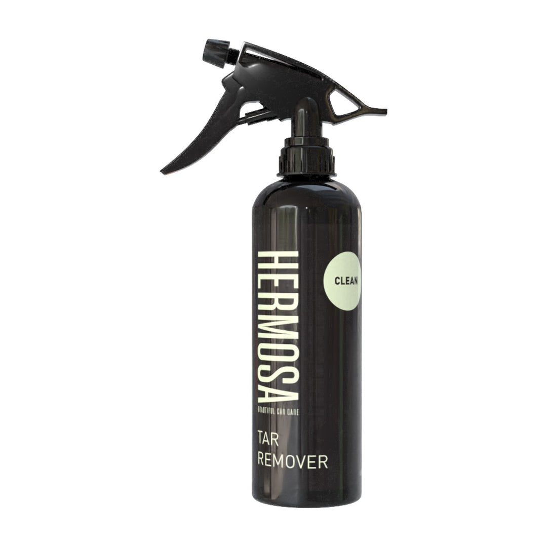 Hermosa Tar Remover spray bottle with black nozzle, labeled 'CLEAN' and 'TAR REMOVER.'